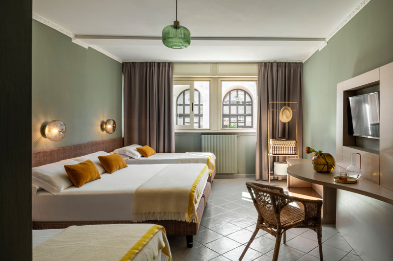 Vista generale della camera quadrupla con due letti singoli e un letto matrimoniale - Hotel Marisa, BZAR hotels a Roma - Vista 1